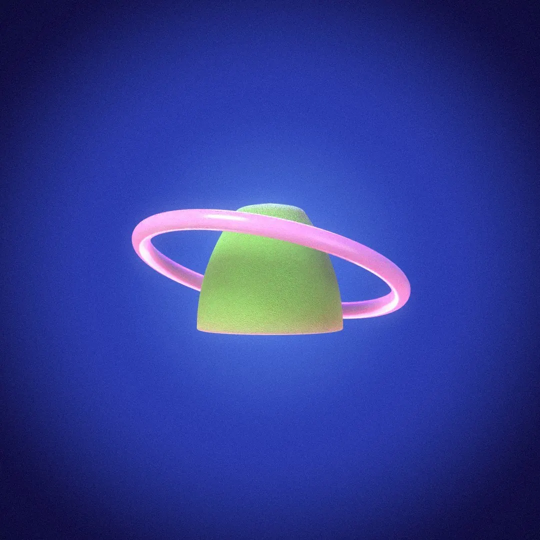 A green gumdrop crusted with sugar crystals inside a pink ring.