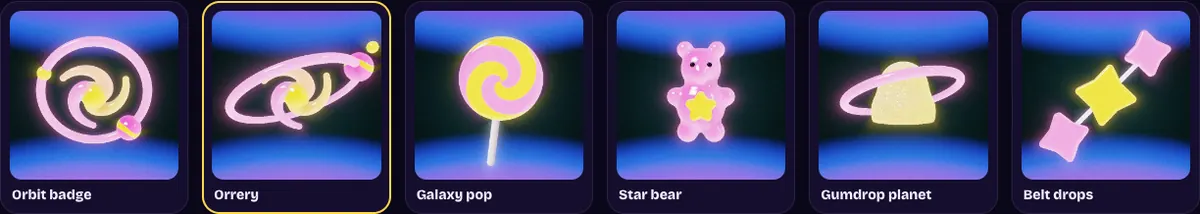 Six ray-marched gummy marks in a row: orbit badge, orrery, galaxy pop, star bear, gumdrop planet, and belt drops.